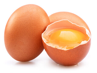 Brown chicken eggs and egg yolk isolated on white background.