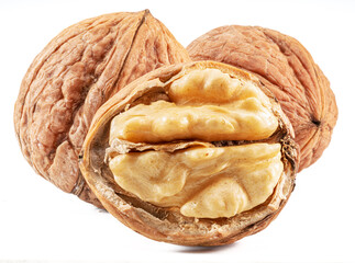 Walnuts and opened walnut with fresh kernel isolated on white background.