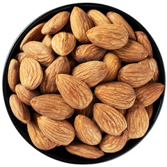 Almond in dark bowl isolated on white background. top view