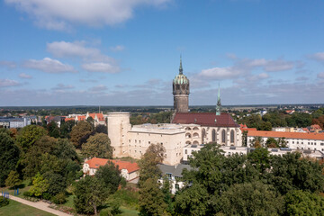 Fototapeta na wymiar historischen Schlosskirche und Schlossturm, Lutherstadt Wittenberg, Sachsen-Anhalt, Deutschland