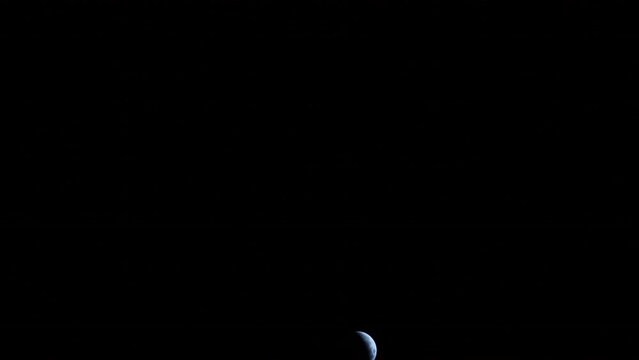 Lockdown Shot Of Crescent Moon Moving In Dark Sky At Night - Los Angeles, California