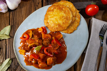 Hungarian goulash with potato pancakes