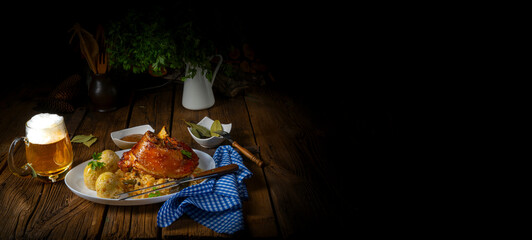 pork knuckle with sauerkraut and sweet mustard