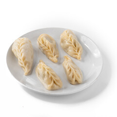 Traditional Dumpling Momos Served on white plate.