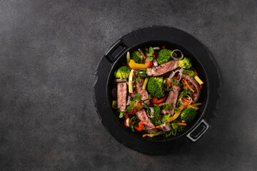 Beef with vegetables. Prepared in a wok.