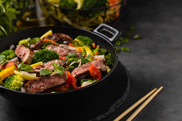 Beef with vegetables. Prepared in a wok.