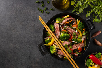 Beef with vegetables. Prepared in a wok.