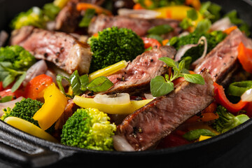 Beef with vegetables. Prepared in a wok.
