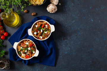 Traditional Greek cuisine. Lamb stew with feta cheese and vegetables.