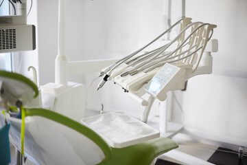 Equipment and dental instruments in bright modern dentist's office.