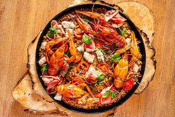 Valencia paella with assorted seafood and shellfish i