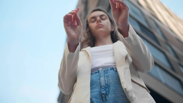 Woman breaks cigarette and quits smoking outdoors