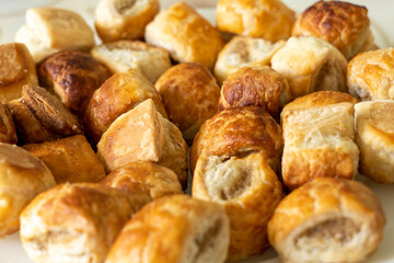 Sausage rolls served on a plate. Selective focus.