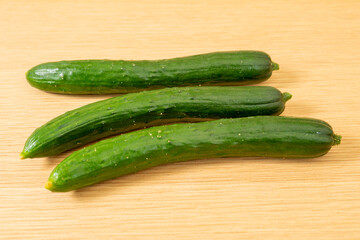 cucumbers on a wooden table
