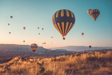 Sunrise tourists attraction on hot air balloons in Cappadocia. Sunset hill panoramic view. Best...
