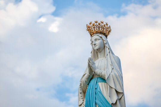 Lourdes, France. September 1, 2022. Close-up of the Virgin Mary crowned in the Sanctuary of Lourdes