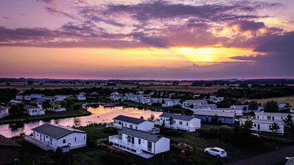 Fototapeta na wymiar sunset over the town drone