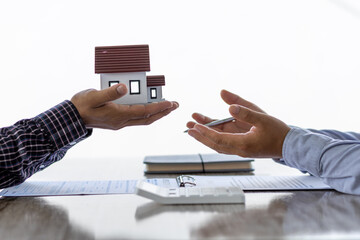 Real estate inheritance concept and contract agreement. The customer makes a rental contract with the landlord.