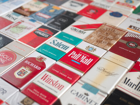 Soligorsk, Belarus - 5 September 2022: Many different packs of cigarettes, selective focus
