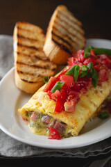 Omelette stuffed with ham cheese and dill