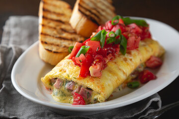 Omelette stuffed with ham cheese and dill