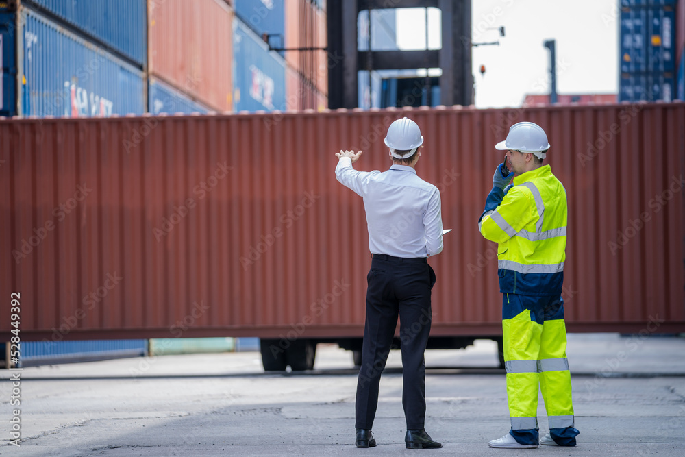 Aufkleber Professional engineer with worker or technicians discuss together working checking at Container yard warehouse,Cargo Shipping Import and Export industry.