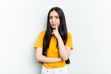 Young caucasian woman isolated on white background unhappy looking in camera with sarcastic expression.