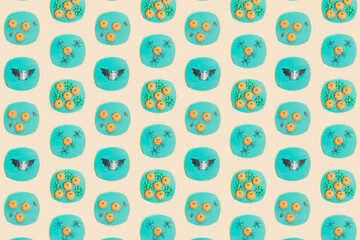 Retro Halloween pattern. Turquoise color plates with pumpkins, spiders, bat, ribbons and flies. Vintage aesthetic background.