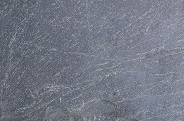 Dark grey slate surface background