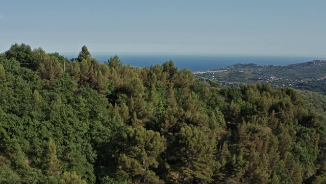 Flying over Ligurian mountain in Italy