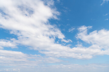 Naklejka na ściany i meble nature background of blue sky with white clouds
