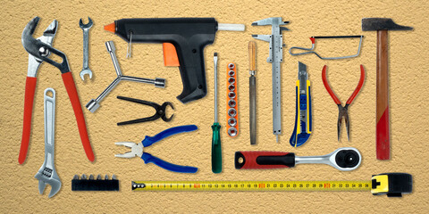 Topview of Different Work Tools on Textured Background- Stock Photo