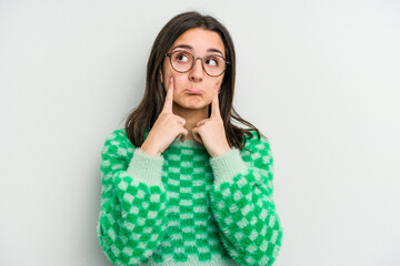 Young caucasian woman isolated on white background crying, unhappy with something, agony and confusion concept.