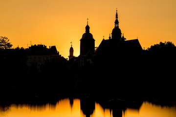 Silhouettes of buildings in town center during sunset. Architercture of Nowy Sacz, town in Poland