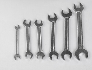 set of steel wrenches arranged in ascending order. Isolated on a white background.