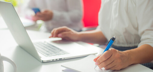 Business woman or accountant working with financial investment on calculator, calculating, analyzing business and marketing growth on financial documents data graph, accounting, economic, commercial 