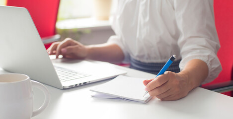 Business woman or accountant working with financial investment on calculator, calculating, analyzing business and marketing growth on financial documents data graph, accounting, economic, commercial 