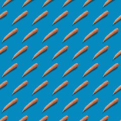 Pattern Fresh carrot pattern on blue background. 