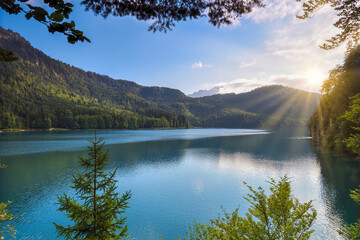 Gorgeous emerald-green lake Alpsee in the German Alps, Allgau, Bavaria, Germany