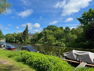 Beautiful view of canal with moored boats on sunny day