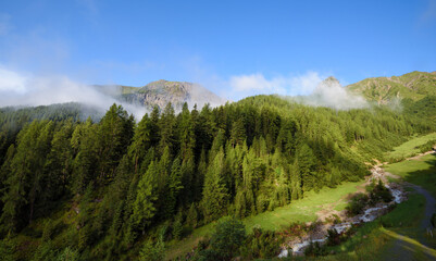 Fototapeta na wymiar Beautiful summer mountain landscape in the Alps. Sunny morning