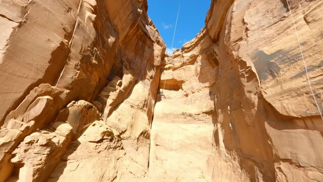 Reversing Through A Canyon From A Man Swinging On A Bungee Cord - Moab, Utah