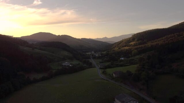 Aerial view of the green fields of the basque country at sunset, northern Spain