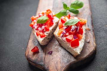 bruschetta basil tomato sandwich snack vegetables healthy meal food snack diet on the table copy space food background rustic top view veggie vegan or vegetarian food