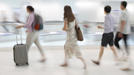 Abstract image of people in motion with blurred background