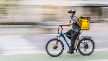 Courier delivering an order on a bicycle