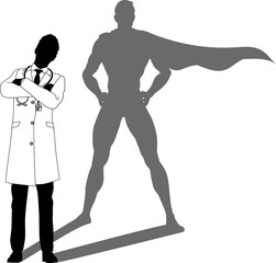 A superhero medical doctor man health care worker revealed by his shadow silhouette as a super hero in a cape.