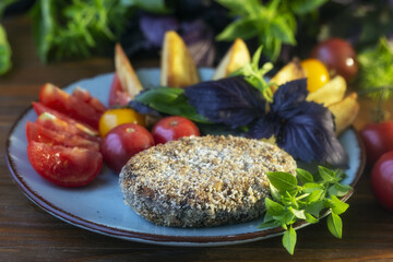 Vegetarian bean and soy patty with tomatoes, marjoram and basil. Vegetarian plant based meat burger...