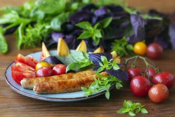 Sausages with tomatoes, basil and marjoram