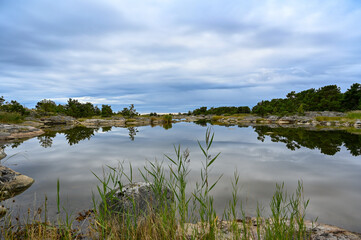 standing on island overlooking Stockholm archipelago Sweden